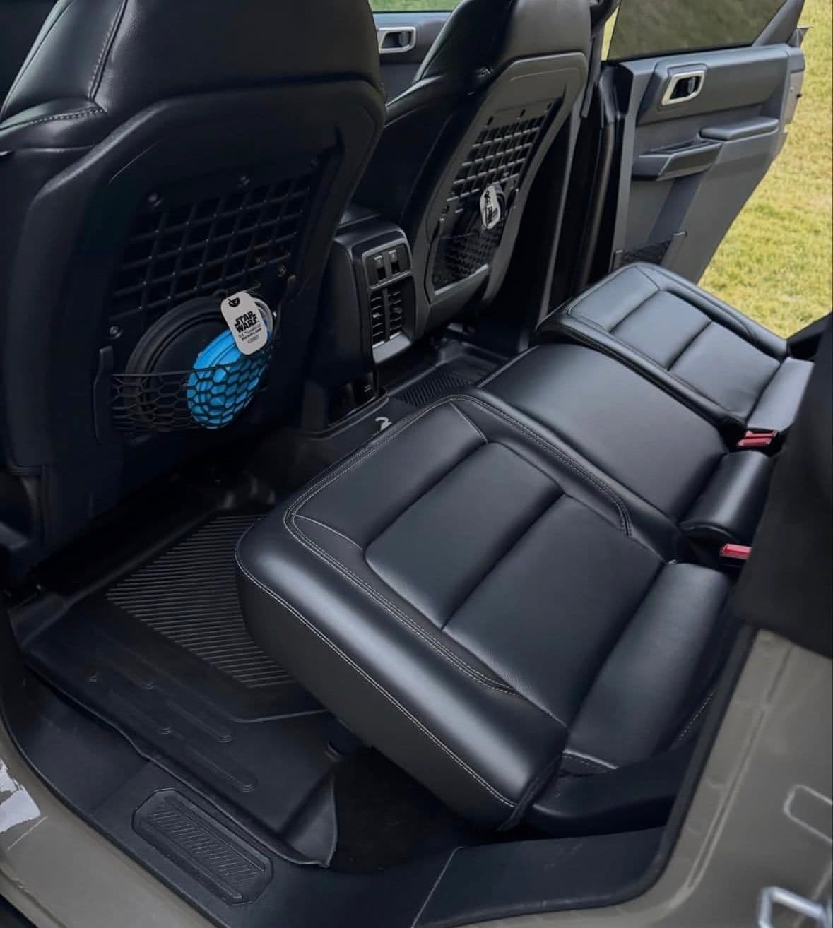 The same Ford Bronco rear seat area clean after detailing.